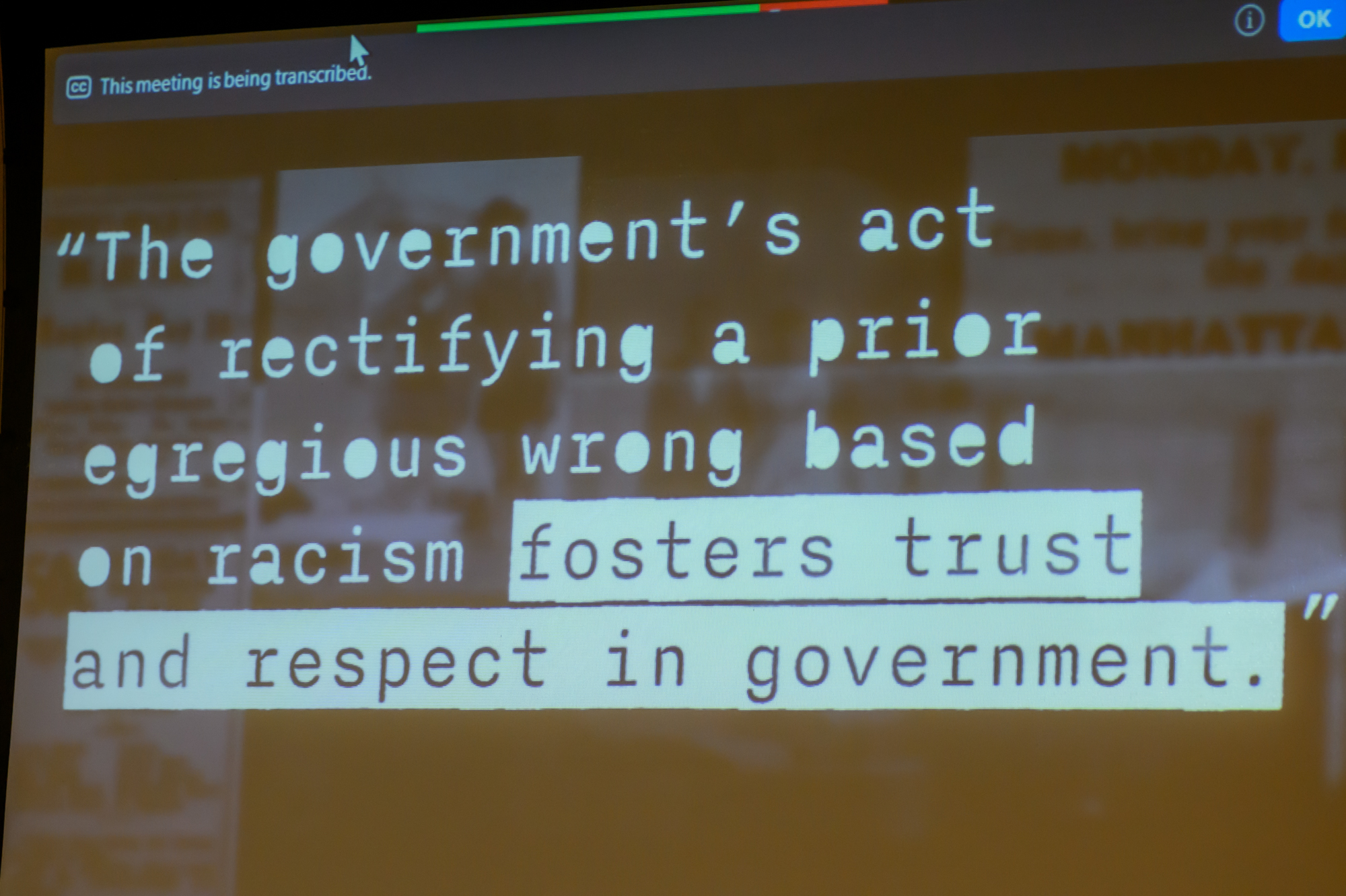 A projection shows an excerpt from the Court's decision on Bruce's Beach. It reads, "The government's act of rectifying a prior egregious wrong based on racism fosters trust and respect in government."