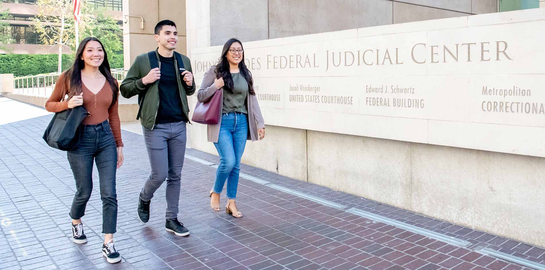 Students walking in front of Judicial Center in downtown San Diego