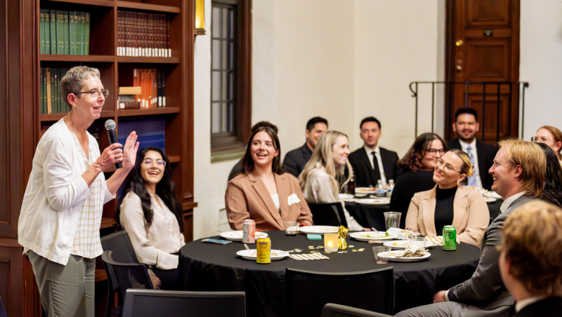 Bobbie Thyfault speaking at a banquet with students and CAP supporters.