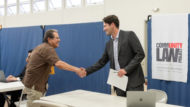 Community Law Project student intern greets a client