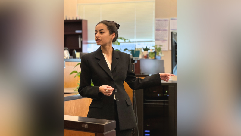 3L Jessica Zaki presents an opening statement in a Competitive Advocacy Program trial team practice session