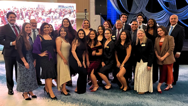 The scholarship-winning students gathered with Dean Miriam Baer, faculty and staff