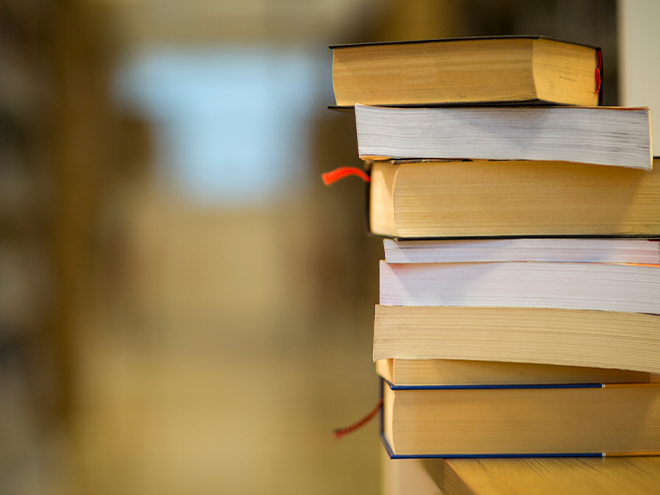 Legal books stacked on desk